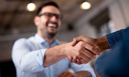 Business people shaking hands